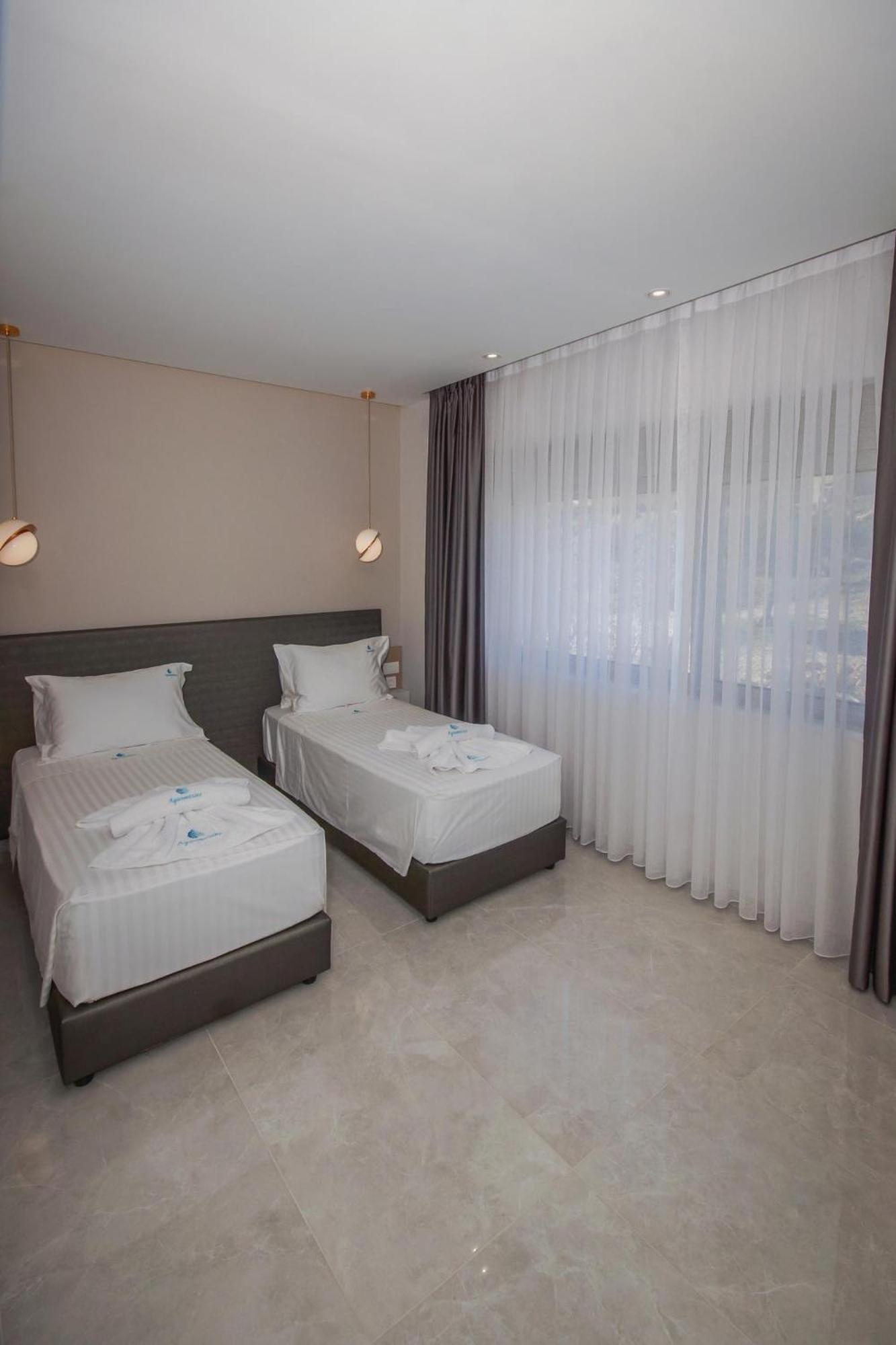 Aquamarine Luxury Suites Archangelos  Exterior foto