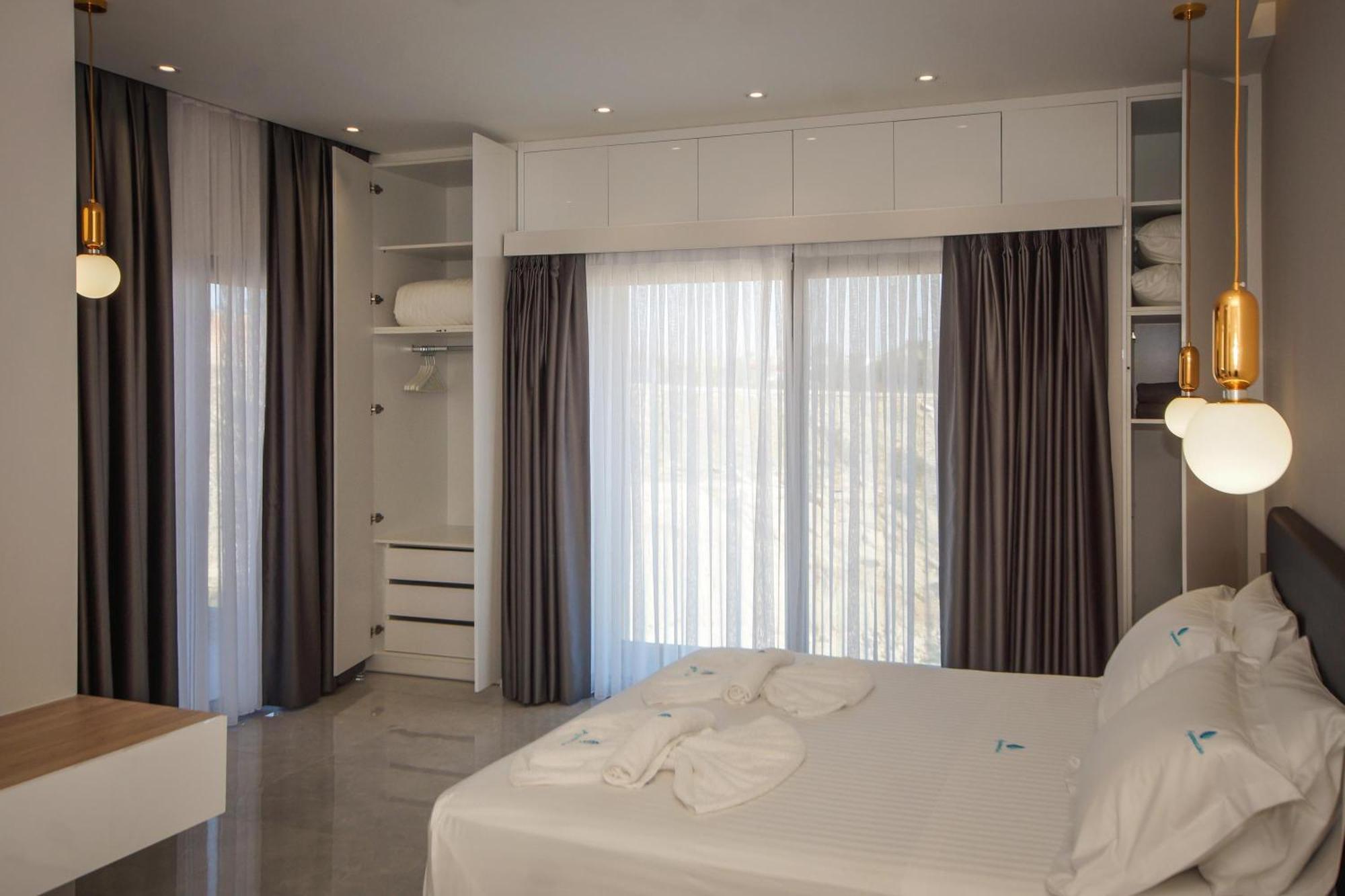 Aquamarine Luxury Suites Archangelos  Exterior foto